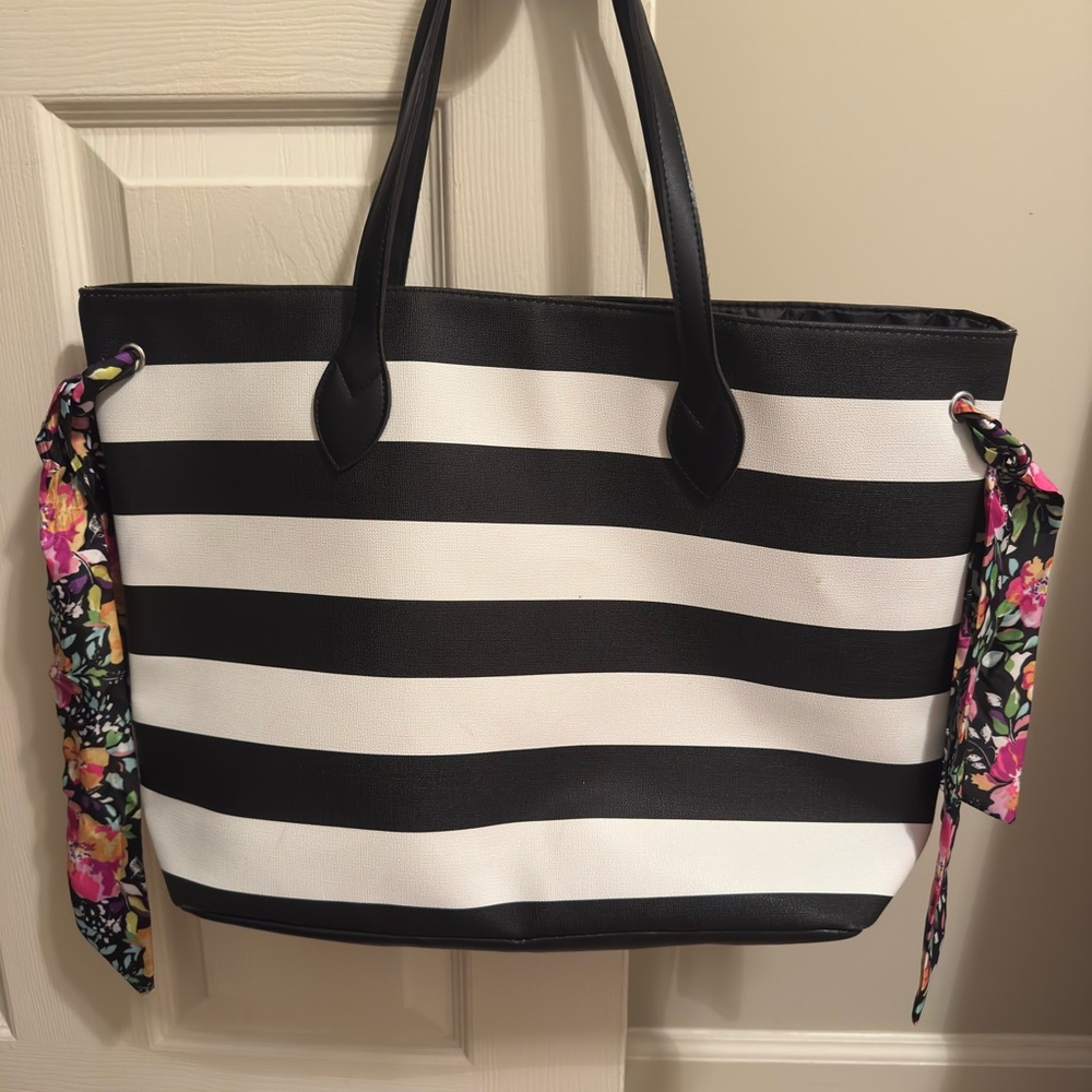 Elegant Black and White Striped Tote with Floral Details